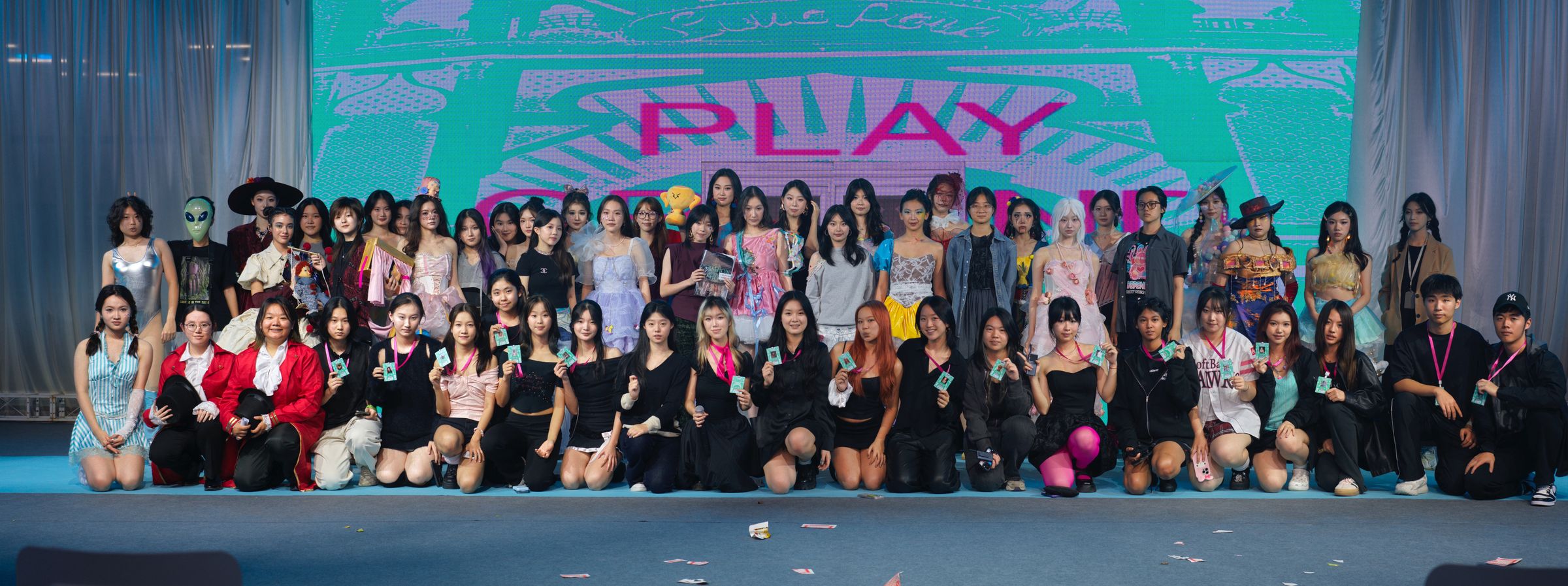 Full cast on stage at the end of the annual school fashion show